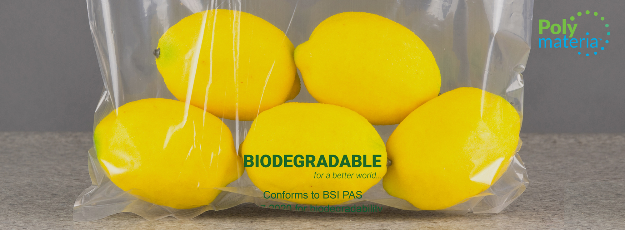 Biodegradable packing bag containing lemons